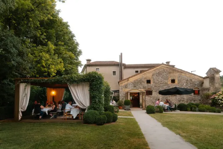 people dining outdoors at a charming Italian restaurant