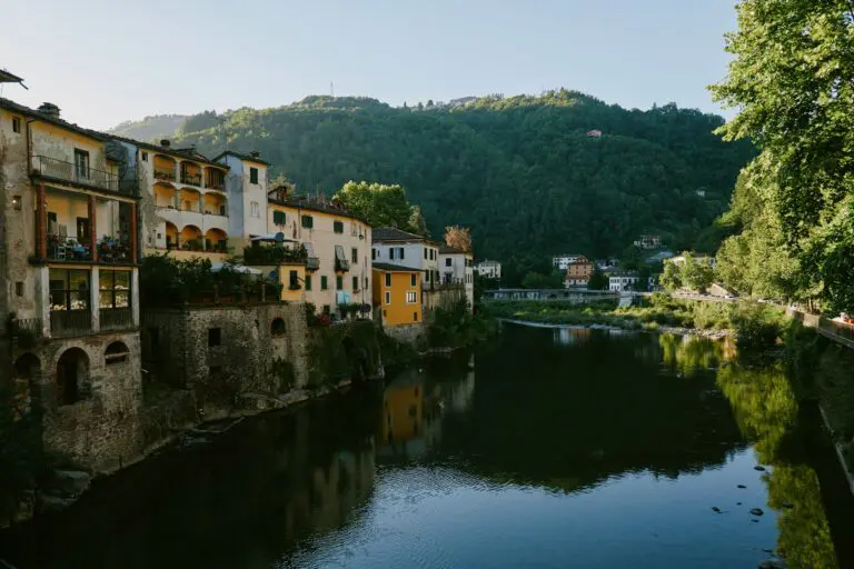 historic Italian village along a river in Tuscany